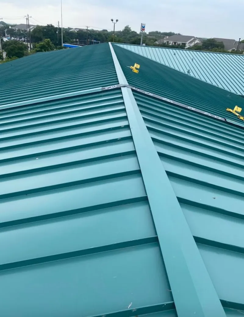 Green commercial metal roof ridge and valley for Metal Roof Repair in Lockport