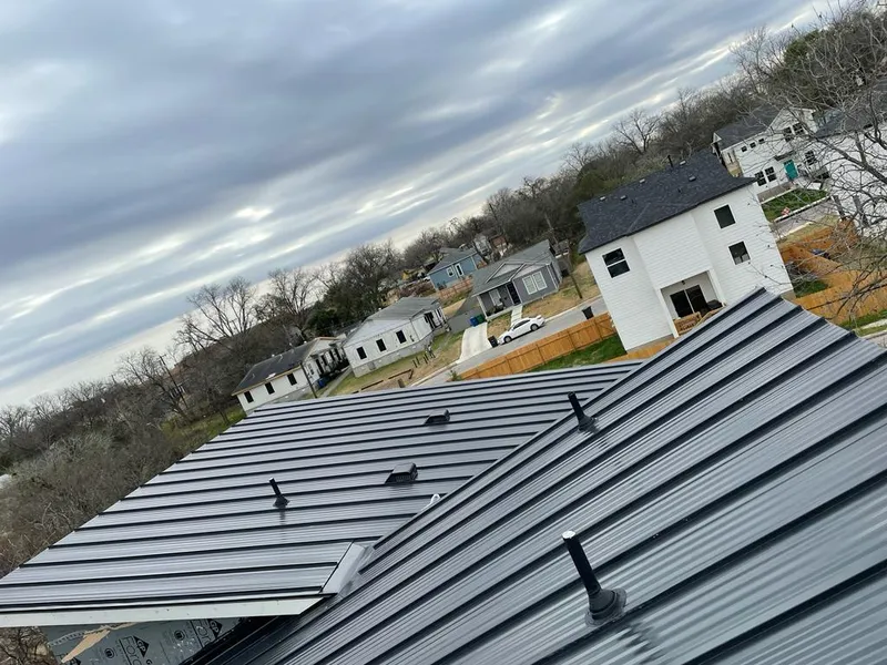 Standing seam metal roof panels with vents for Skylight Repair in Lockport